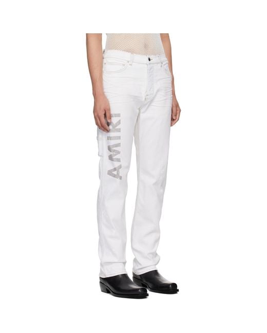 Amiri White Army Logo Painted Slim Workman Jeans for men