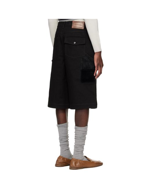 ANDERSSON BELL Black Faux Pony Patchwork Carpenter Shorts for men