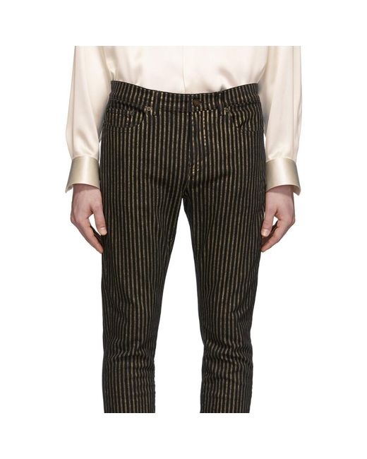 black jeans with gold stripe