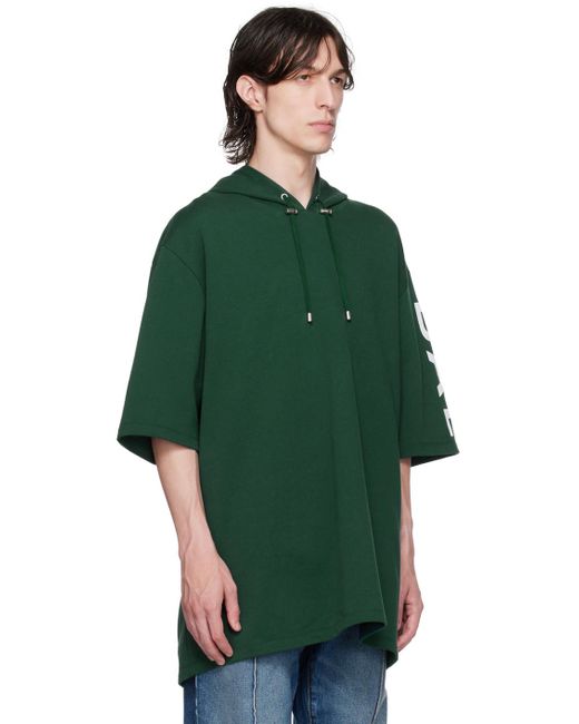メンズ Balmain ーン ロゴプリント フーディ グリーン | Lyst