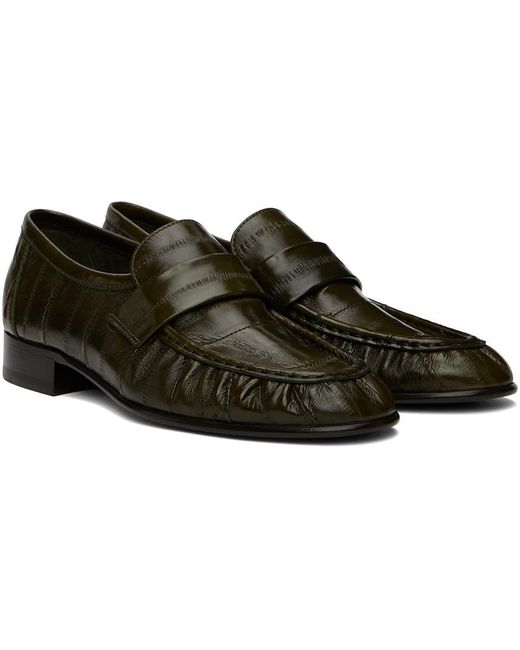 The Row Black Eel Crinkled Glossed-leather Loafers