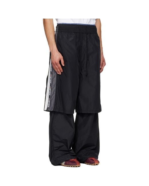 we11done Black Triple Layered Track Pants for men