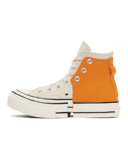 white converse orange bottoms