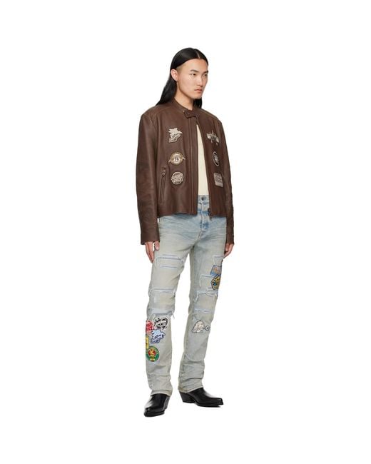 Amiri Blue Station Patch Repair Slim Jeans for men