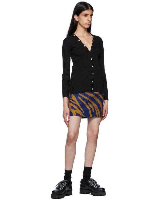 Proenza Schouler black hiking boots styled for luxury outdoor wear