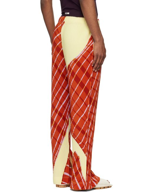 Homme Plissé Issey Miyake Red Windswept Plaid Trousers for men