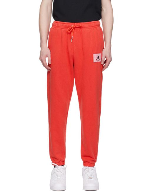 Pantalon de survêtement à effet délavé Nike pour homme en coloris Red