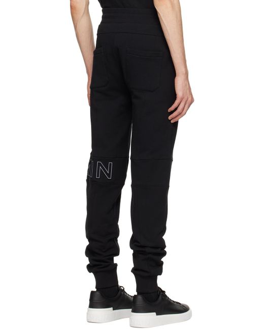 Pantalon de survêtement noir à logo gaufré Balmain pour homme en coloris Black