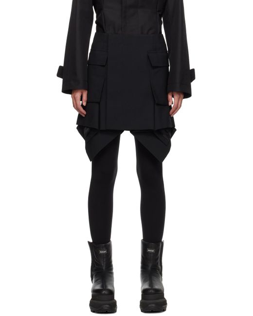 Mini-jupe noire à basque Sacai en coloris Black
