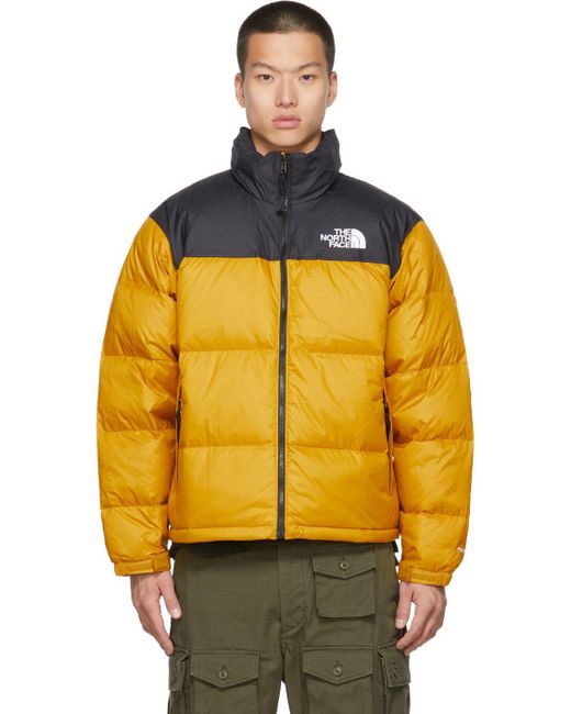 yellow puffer jacket north face
