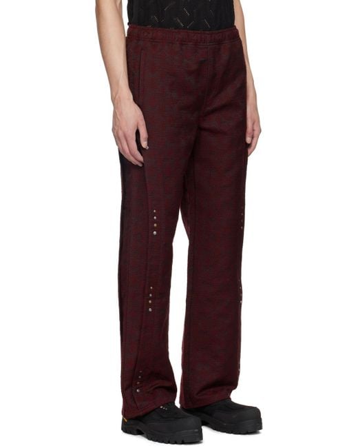 ANDERSSON BELL Red Wave Sweatpants for men