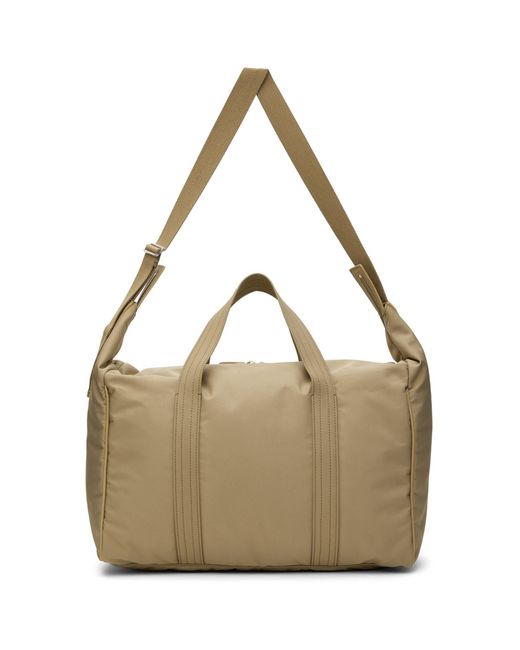The Row Metallic Beige Logan Duffle Bag for men