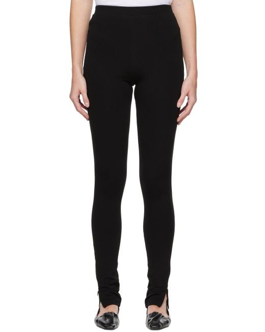Totême Synthetic Zip leggings in Black | Lyst