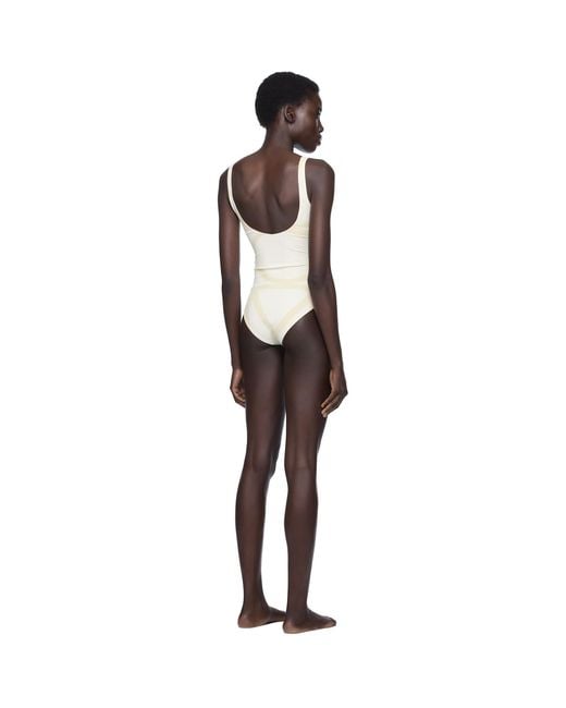 Totême Black Monogram Swimsuit
