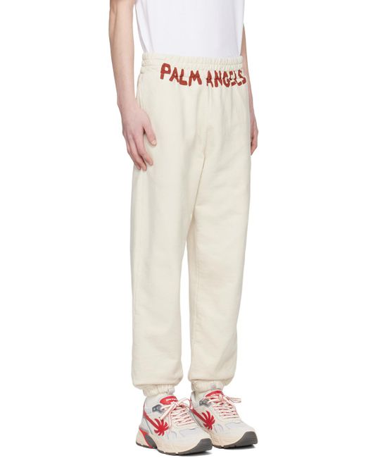 メンズ Palm Angels オフホワイト ロゴプリント スウェットパンツ White