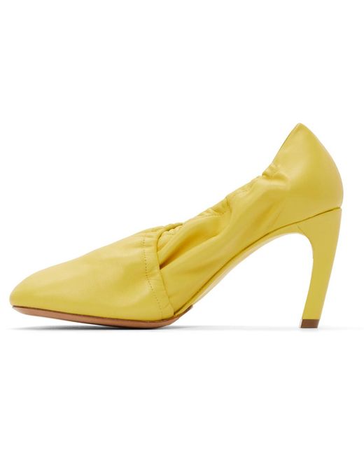 yellow round toe pumps