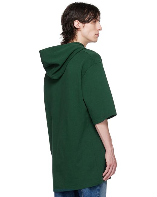 メンズ Balmain ーン ロゴプリント フーディ グリーン | Lyst