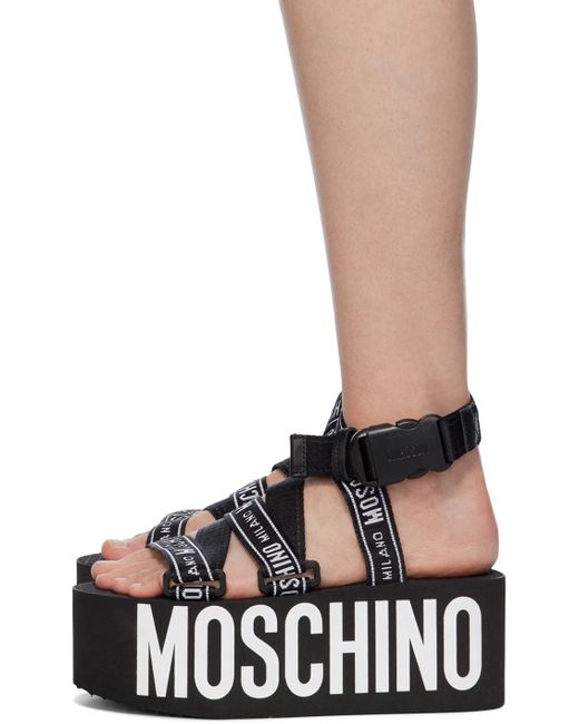 Sandales noires à plateforme et à logos Moschino en coloris Black