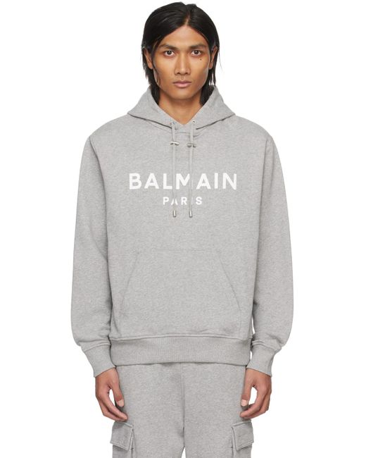 Pull à capuche gris à logo imprimé Balmain pour homme en coloris Gray