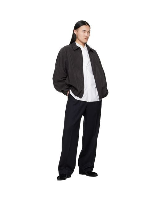 Ssstein Black Silk Nylon Collared Zip Jacket for men