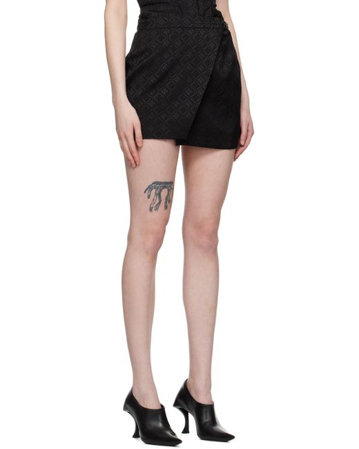 Mini-jupe noire à motif moon et à carreaux - line MARINE SERRE en coloris Black