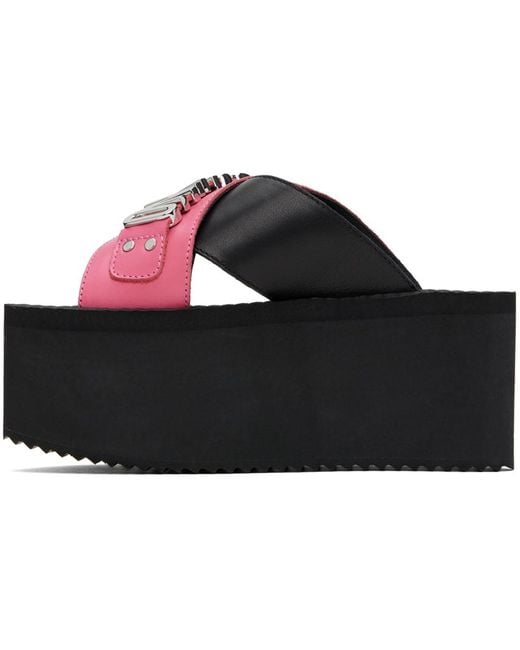 Sandales compensées noir et rose à ferrure à logo Moschino en coloris Black