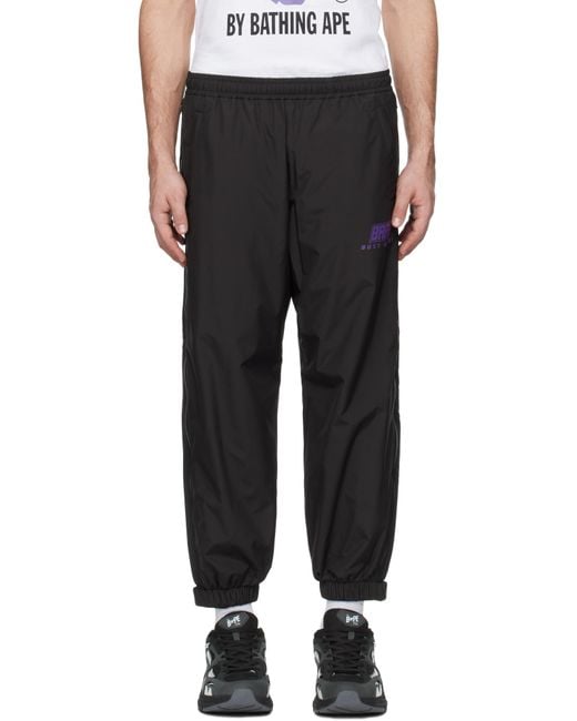 A Bathing Ape Black Color Camo Deformation Track Pants for men