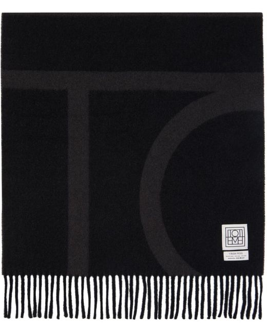 Écharpe noire en laine à monogrammes en tricot jacquard Totême  en coloris Black