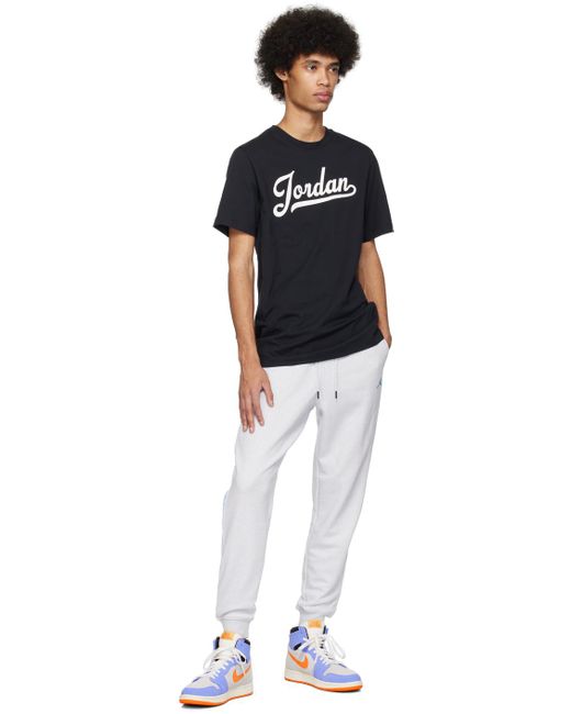 Pantalon de survêtement gris à logo brodé Nike pour homme en coloris White