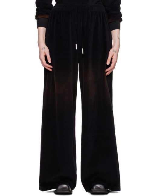 Pantalon de détente noir à logo gaufré Acne en coloris Black