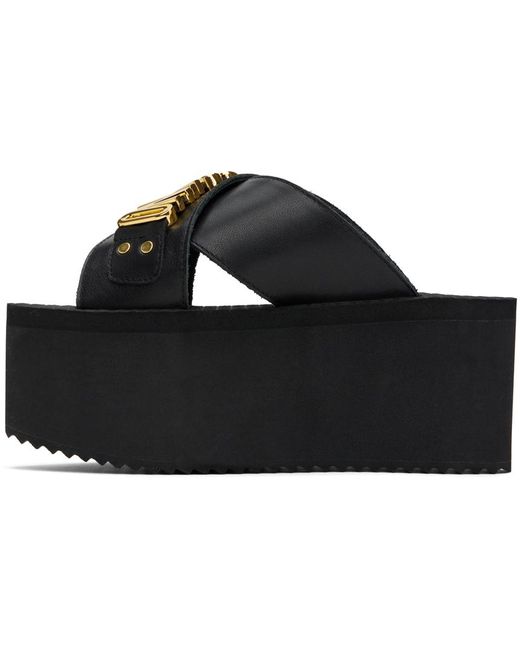 Sandales compensées noires à ferrure à logo Moschino en coloris Black