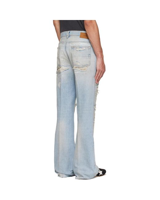 Amiri Black Camo Repair Boot Cut Jeans for men