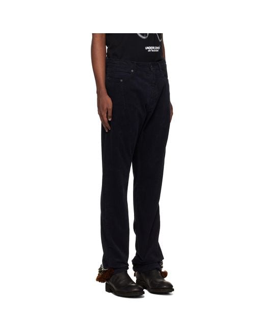 Undercover Black Contrast Hem Trousers for men