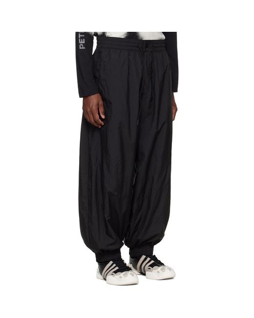 Y-3 Black Raw Edge 3 Stripes Nylon Shell Track Pants for men