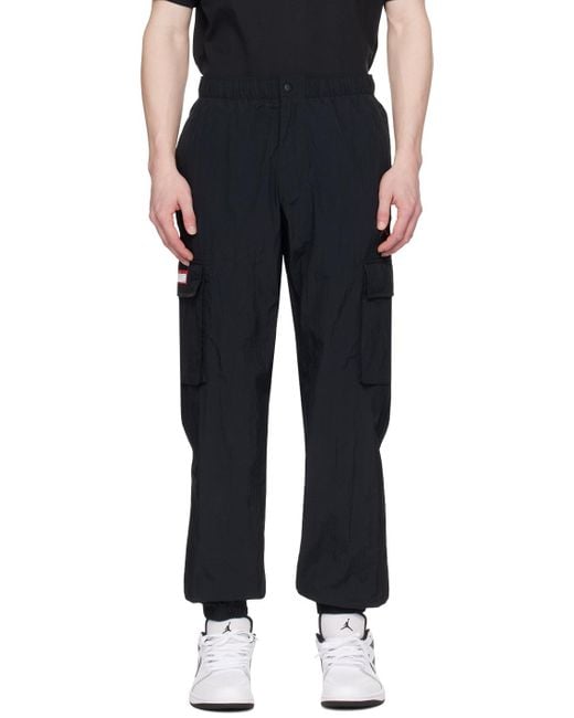 Pantalon cargo noir à logo Nike pour homme en coloris Black