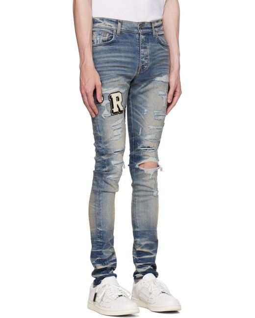 Amiri Blue Skinny-fit Logo-appliquéd Distressed Jeans for men