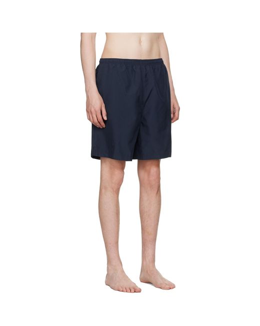 AMI Blue Long Plain Swim Shorts for men