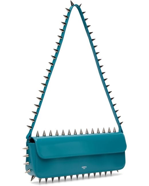 Sac Baguette Bleu À Clous Abra en coloris Blue