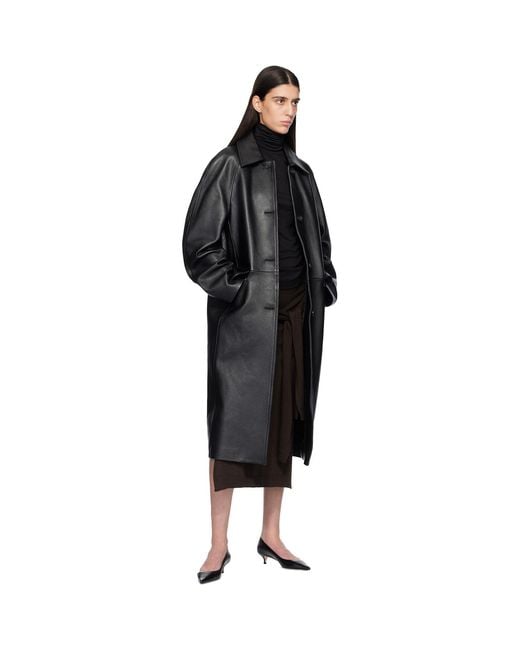 Totême Black Raglan Leather Coat