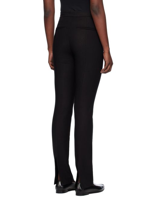 Pantalon ajusté noir Totême  en coloris Black
