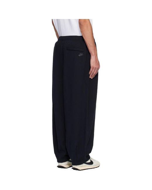 Nike Black Club Oversized Cuffed Fleece Sweatpants for men