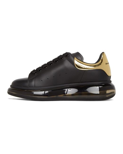 Alexander McQueen Leather Black And Gold Clear Sole Oversized Sneakers ...