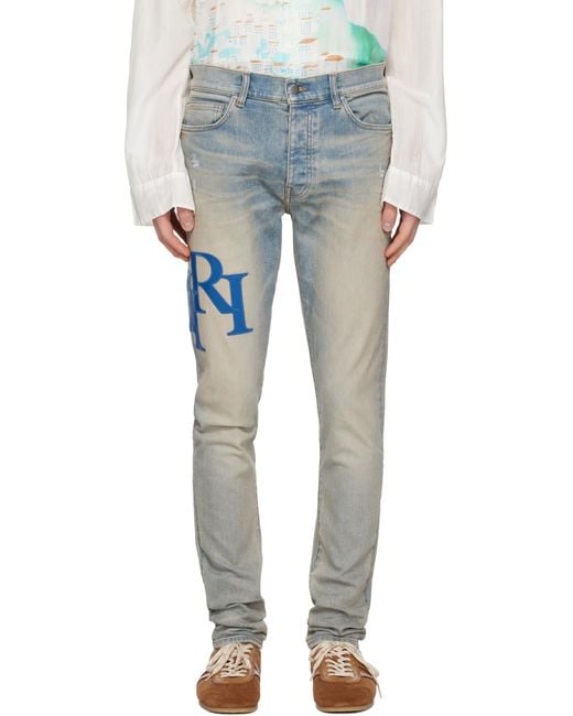 Amiri Blue Staggered Logo Skinny Jeans for men