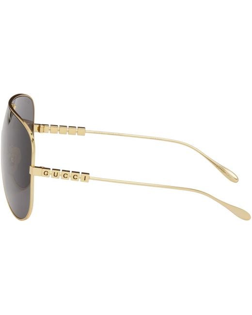 Gucci Black Gold Mask Sunglasses