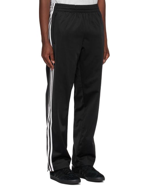 Adidas Originals Black Firebird Track Pants for men