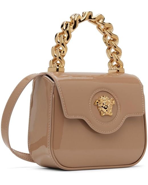 Mini sac à main taupe Versace en coloris Brown