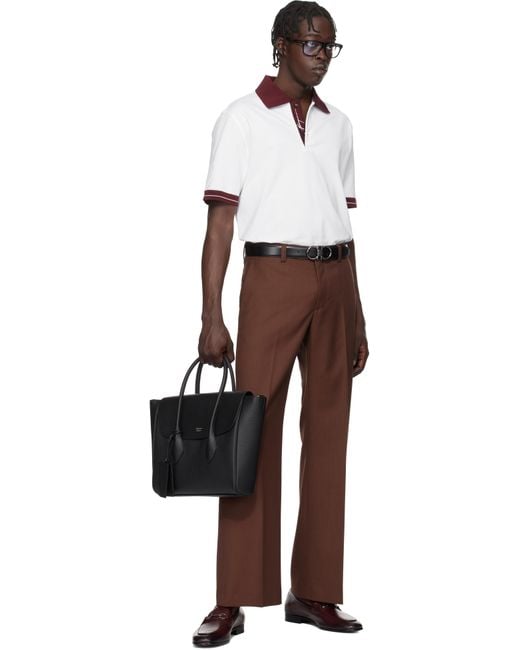 【関税込み】Ferragamo ブラック East-West ブリーフケース East-West tote bag (XL) - Women | Ferragamo