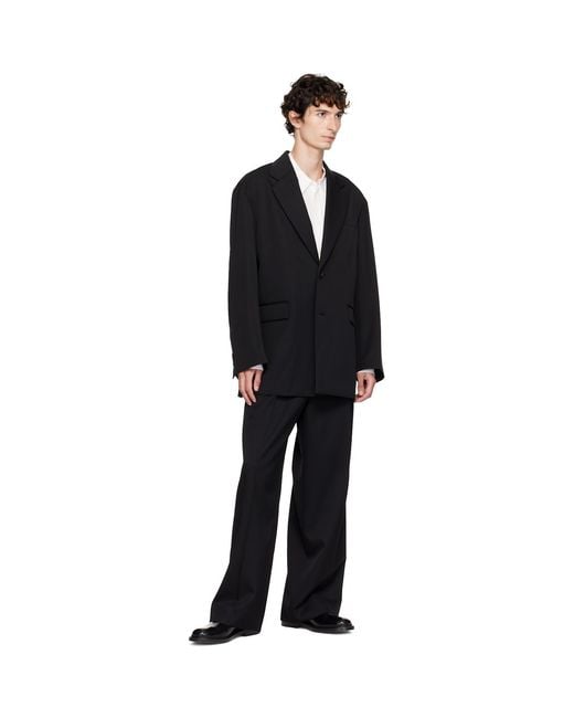 Ssstein Black Oversized Single Breasted Long Blazer for men