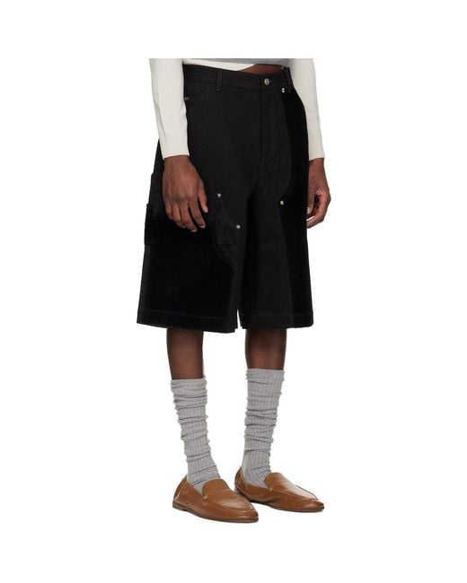 ANDERSSON BELL Black Faux Pony Patchwork Carpenter Shorts for men