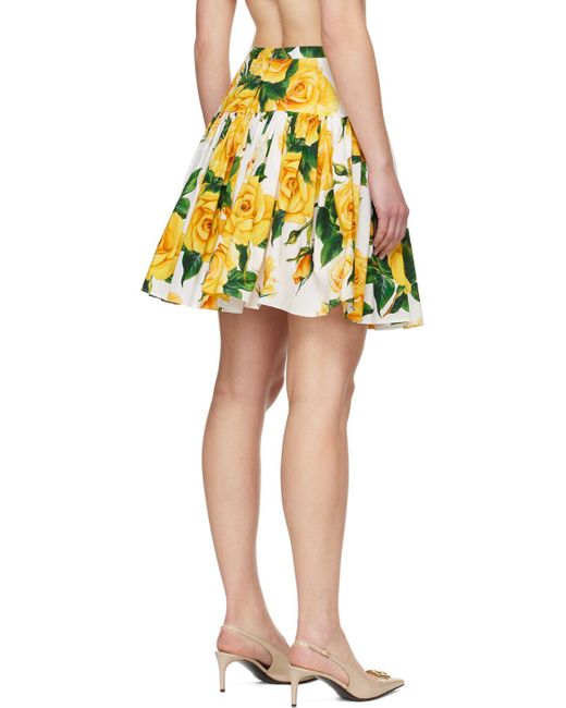 Mini-jupe blanc et jaune à motif fleuri Dolce & Gabbana en coloris Yellow